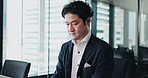 Laptop, typing and business with Japanese man in office for lawyer, legal journal and case research. Professional, corporate and email with Asian person in law firm for planning, online and report