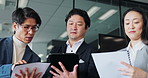 Paperwork, tablet and Asian business people in meeting for planning project, proposal and feedback. Corporate, teamwork and Japanese man and woman on digital tech for reading, research and discussion