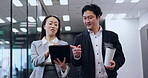 Japanese, people and walking with tablet in office for finance report, planning budget and investment. Staff, teamwork and digital of financial schedule, review proposal and project feedback in Japan