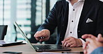 Business people, hands and pointing with laptop in meeting for coaching, proposal or communication at office. Closeup, businessman or employee talking to colleague with computer for project or ideas