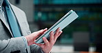 Hands, outdoor and man with tablet, employee and typing with digital app, trading and Japan. Closeup, economy analyst or person in city, tech and website info with investment and email notification