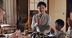 Japanese family, home and prayer at dinner for food, happiness and healthy meal in bonding together. People, child and hungry with thank you, gratitude and nutrition in dining room at table with care