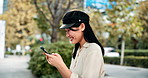 Woman, typing and laughing with phone in city for funny text message, morning commute or online networking. Japanese person, travel and smartphone in town for mobile chat joke and social media meme