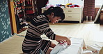 Woman, seam and material for fashion with designer, manufacturing or production for tradition, culture and style. Japanese person, lines and factory with fabric, inspection and clothes at workshop