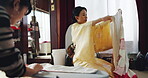 Japanese fashion designer, sewing cutting fabric and measurement with iron in atelier or workshop. Women, clothing and teamwork as tailor for project as dressmaker for creative or manufacture process