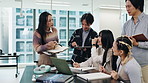 Meeting, laugh and Asian business people planning for online project, research and feedback. Creative company, happy and men and women on laptop for teamwork, collaboration and discussion in Japan