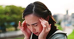 Face, fitness and headache with woman in city for exercise, running or training difficulty. Burnout, stress and tension with Japanese athlete or runner outdoor for physical activity and workout