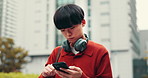 Japanese, typing and man in city, smartphone and internet with social media, texting and digital app. Asian person, outdoor and guy with cellphone, website info or message to contact or communication