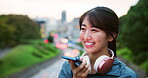 Face, funny and phone call with woman on city bridge for communication or remote work. Recording memo, talking or voicemail with Japanese business employee laughing outdoor for planning or reminder