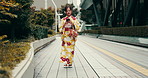 Japanese woman, mobile and search in city for building, location and destination with social network. Asian person, thinking and phone app in urban town for adventure, travel and holiday with kimono