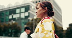 Travel, woman and walking in kimono outdoor for adventure, exploring and journey in Japan street. Person, traditional yukata and commuting in urban town for weekend trip, holiday and vacation in city