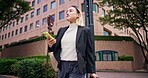 Japanese, businesswoman and smartphone in city for travel, commute and attorney for corporate firm. Walking, female person and lawyer with mobile app for online map, location navigation and luggage
