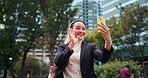 Happy, asian woman or wave with phone or video call in city for travel, virtual meeting or hello. Japanese, female person or employee with smile for communication, online chat or app in an urban town