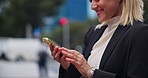 City, hands and woman with smartphone for communication, chat or schedule appointment for meeting. Outdoor, corporate lawyer and smile with mobile app for networking, notification and travel in Japan