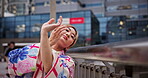 Culture, woman and dancing in kimono in city with hand movement, contemporary style or expression. Japanese person, creative dancer or nihon buyo in traditional fashion on outdoor bridge for heritage