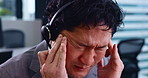 Asian man, headache and stress in call center with pain, burnout and temple massage for relief. Mature agent, headset and migraine in Japanese agency for telemarketing mistake, crisis and frustrated
