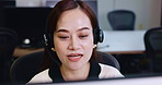 Asian woman, call center and agent with headphones for telemarketing or customer service at office. Japanese, female person and consultant with headset for telecommunications agency or online advice