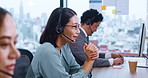 Asian woman, consultant and team with headphones at call center for customer service or telemarketing at office. Japanese, female person or agent with headset for telecommunications at online agency