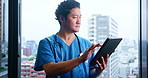 Japanese doctor, thinking and tablet for results, surgery or diagnosis in hospital in reading report. Male person, technology and scroll for health services, medicine and wellness in clinic as medic
