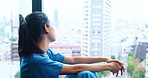 Nurse, woman and thinking by hospital window with depression, surgery anxiety or doubt in city. Medical, professional and thoughtful in Japanese clinic for healthcare challenge, overworked or burnout