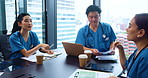 Doctor, team and meeting with discussion in office for healthcare planning and medical development. Hospital, Japanese people and documents for test results review, health report and surgery analysis