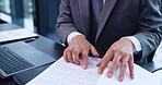 Japanese businessman, laptop and reading with document, report and research in corporate office. Male person, technology and paperwork for work as accountant, management and company in finance agency