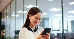 Asian woman, typing and phone for walking in office, investment banker and online for advisory. Female person, financial feedback and chat to client for deal, plan and message contact in workplace