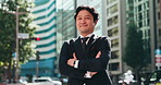 Japanese, businessman and face in city for arms crossed, pride and travel in morning to workplace. Urban, mature employee and corporate lawyer with smile for career, ambition and confidence in Tokyo