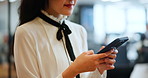 Woman, hands and phone for typing in office, investment banker and online for advisory. Female person, financial feedback and chat to client for deal, professional and message contact in workplace