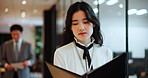 Business woman, Japanese and reading in paperwork for contract, agreement or proposal as idea. Female person, walking and documents as trading portfolio. investment or stock market in office building