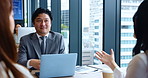 Japanese, business people and talking for meeting, pitch or proposal in office building for discussion. Group, colleagues and teamwork for collaboration, brainstorming and project for finance agency