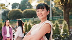 Arms crossed, face and leadership with business woman outdoor for confidence or pride in work. Happy, portrait and smile of Japanese employee in nature park for corporate team building event