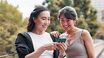 App, fitness and woman with Japanese women outdoor together for health, sports or wellness tracking. Exercise, smile and social media with athlete friends tracking training or workout progress
