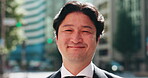 Japanese, businessman and face in city for commute, travel and walking in morning to workplace. Urban, mature employee and corporate lawyer with smile for career, ambition and outdoor trip in Tokyo
