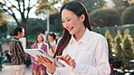 Tablet, laughing or Asian woman in town for research, travel or real estate agent reading news. Funny, businesswoman or happy realtor in city for online listing, meme or urban development.in Japan