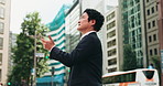 Japanese, businessman and location with smartphone in city for commute, destination and workplace. Lawyer, male person and direction with mobile to search office, travel and job opportunity in Tokyo