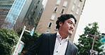 Business man, dance and walking in city for commute, positive attitude and energy with earphones. Employee, happy and music in Japan town for corporate travel, freedom and celebration with streaming