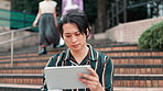 Tablet, steps or Asian man in city for research, project or real estate agent on break by office building. Reading, business or realtor on app for online listing, news or urban development in Japan