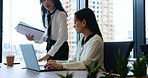 Japanese, business women and laptop with document for tax review, audit or accounting in corporate. Female people, paperwork and tech in office for accountant, finance agency or management in company