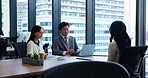 Japanese, business people and talking for meeting, presentation or proposal in office building. Women, man and teamwork for collaboration, brainstorming and project for financial agency as colleagues