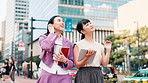 Tablet, people or Asian women in city for walking, research or real estate agents checking office buildings. Talk, business or realtors on app for online listing, ideas or urban development in Japan