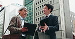 City, meeting and Asian business men with documents for planning, building project and discussion. Corporate, professional and workers with paperwork, report and proposal for collaboration in Japan