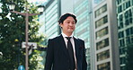Business man, morning and walking in city for commute, positive attitude or work with thinking. Employee, lawyer and ambition in urban Japan for corporate travel, professional or career with building