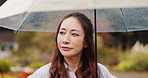 Thinking, umbrella and Asian woman with rain outdoor for commute, journey and travel in nature. Park, winter and happy Japanese person with protection for drops, splash and water in cold weather
