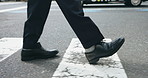 Legs, travel and business person on crosswalk in city with search for direction, landmark or safety in street. Urban road, shoes and feet for steps, trip or pedestrian crossing for traffic in Japan