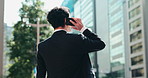 City, phone call and business man with smile, discussion and salaryman on morning commute from back. Urban, street and Japanese businessman with smartphone for communication, networking or connection