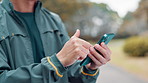 Hands, fitness and athlete with phone in park searching for online exercise program for health. Sports, cellphone and person typing on browsing website for workout routine outdoor in Japanese field.
