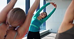 Stretching, ballet and group of dancers in creative class for flexibility with performance, practice or recital. Warm up, studio and ballerinas with rehearsal, concert or theater at academy in Japan.