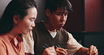 Restaurant, lunch and couple eating together for romantic date, bonding and conversation at table. Love, man and woman at noodle cafe for Japanese food, culture and weekend diet with dinner service