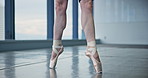Pointe shoes, art and ballerina in studio for stretching with rehearsal, practice or performance. Creative, feet and closeup of classical dancer with warm up for recital, ballet or concert in class.